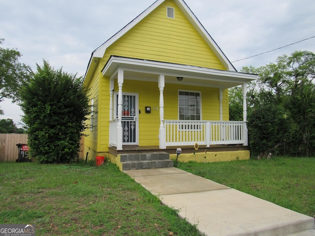 791 Anderson St, Macon, GA 31201 - shotgun-style home with a porch