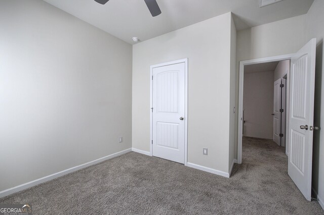 158 Bryon Ln, Acworth, GA 30102 - unfurnished bedroom with carpet, baseboards, and a ceiling fan