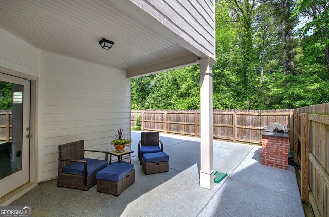 158 Bryon Ln, Acworth, GA 30102 - fenced backyard with a patio and area for grilling