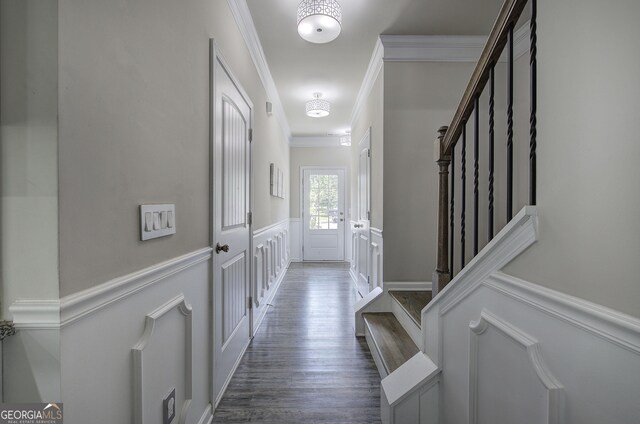 158 Bryon Ln, Acworth, GA 30102 - hallway featuring ornamental molding, a decorative wall, stairs, a wainscoted wall, and dark wood-type flooring