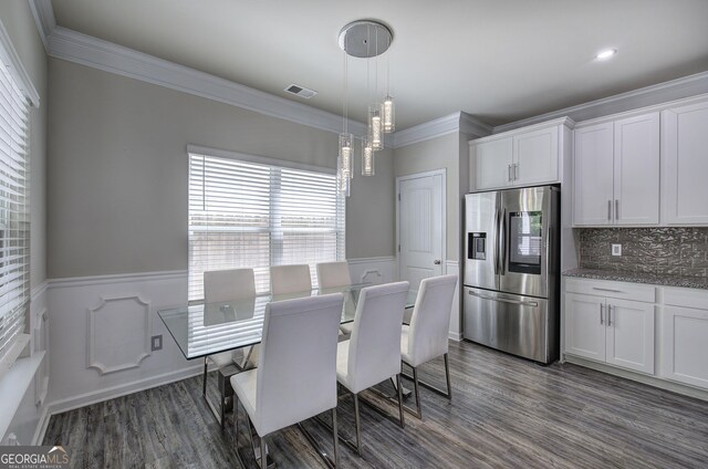 158 Bryon Ln, Acworth, GA 30102 - dining space featuring ornamental molding, a wainscoted wall, and dark wood-style floors