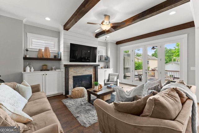 1104 Victoria St NE, Atlanta, GA 30319 - living area featuring beam ceiling, a ceiling fan, a glass covered fireplace, dark wood finished floors, and recessed lighting