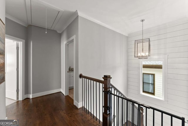 1104 Victoria St NE, Atlanta, GA 30319 - hallway featuring attic access, wood finished floors, baseboards, ornamental molding, and a chandelier