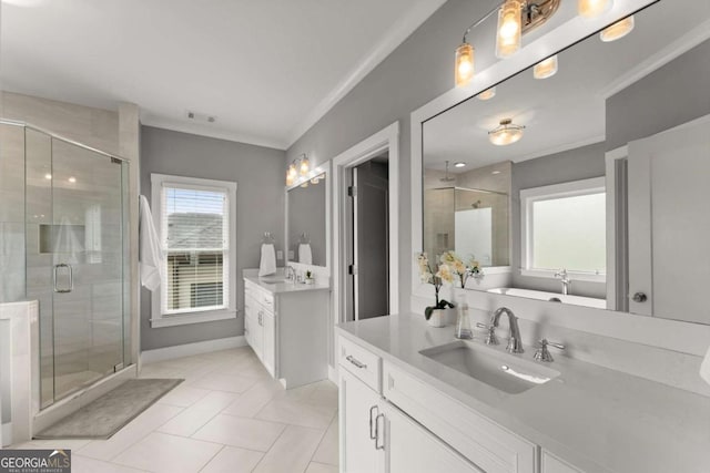 1104 Victoria St NE, Atlanta, GA 30319 - bathroom featuring two vanities, crown molding, a shower stall, tile patterned floors, and a bathtub