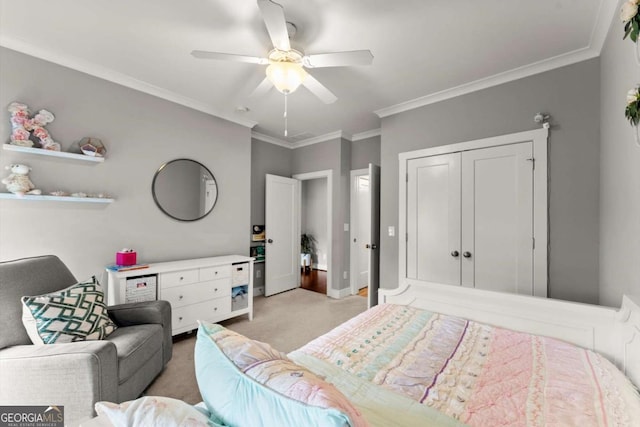 1104 Victoria St NE, Atlanta, GA 30319 - bedroom featuring light carpet, crown molding, a ceiling fan, a closet, and baseboards