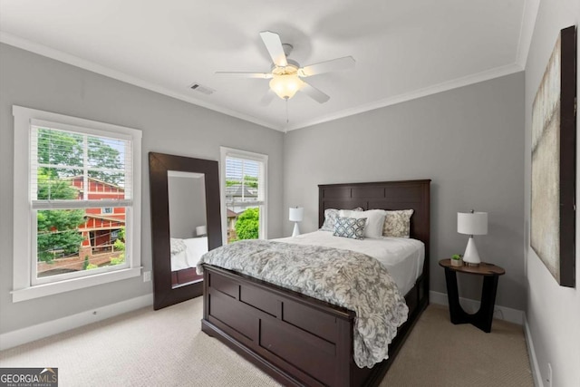 1104 Victoria St NE, Atlanta, GA 30319 - bedroom with light carpet, baseboards, ornamental molding, and ceiling fan