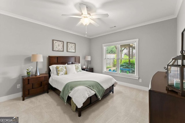 1104 Victoria St NE, Atlanta, GA 30319 - bedroom with light carpet, baseboards, ornamental molding, and ceiling fan