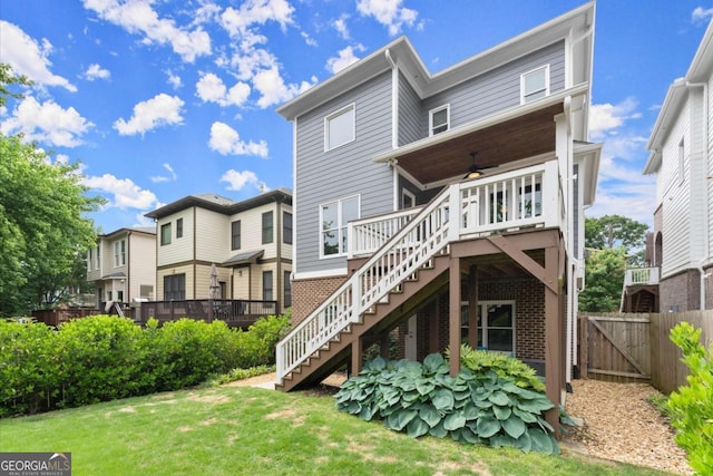 1104 Victoria St NE, Atlanta, GA 30319 - back of house with stairs, ceiling fan, a deck, and a residential view