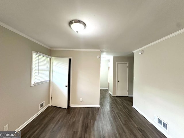 3670 Broadview Ct, Decatur, GA 30032 - unfurnished room with dark wood-type flooring, baseboards, and ornamental molding