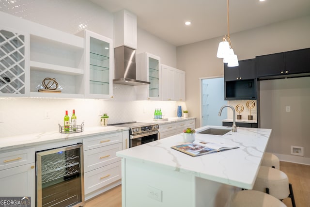 4366 Bradley Dr SW, Snellville, GA 30039 - kitchen featuring beverage cooler, stainless steel range with electric cooktop, a sink, light wood-type flooring, and recessed lighting