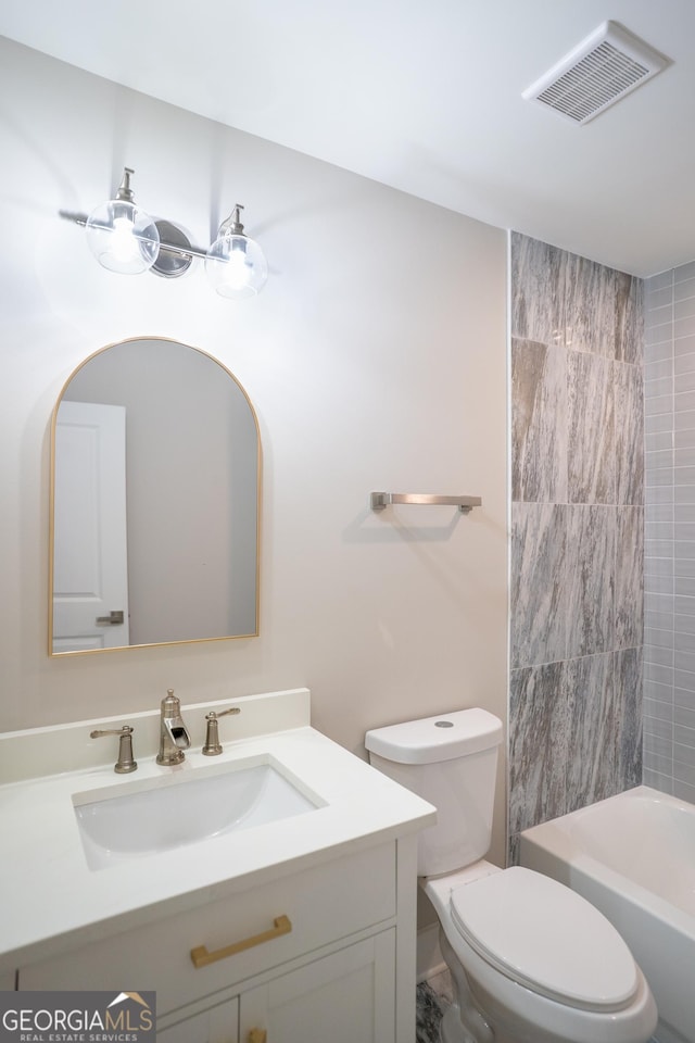 4366 Bradley Dr SW, Snellville, GA 30039 - bathroom with vanity, toilet, and shower / bathtub combination
