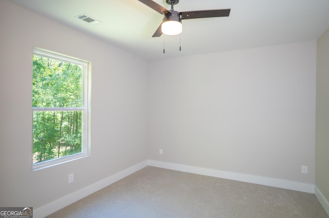 4366 Bradley Dr SW, Snellville, GA 30039 - carpeted spare room with healthy amount of natural light, baseboards, and ceiling fan