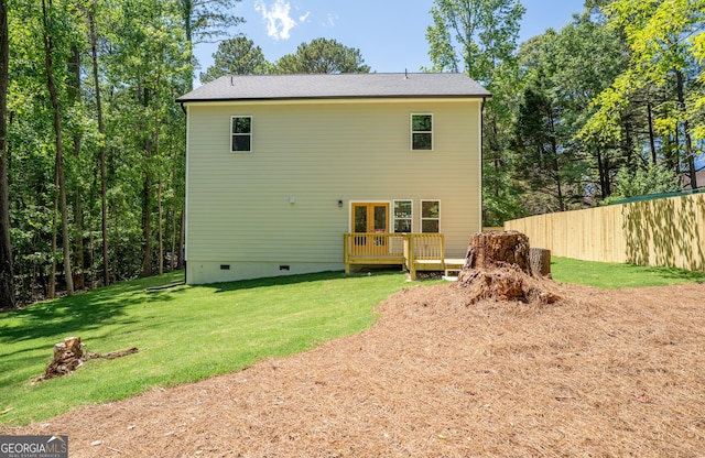4366 Bradley Dr SW, Snellville, GA 30039 - back of property with crawl space and a deck