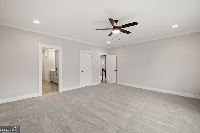 4002 Potter Way, Woodstock, GA 30188 - unfurnished bedroom featuring recessed lighting, light colored carpet, crown molding, baseboards, and connected bathroom