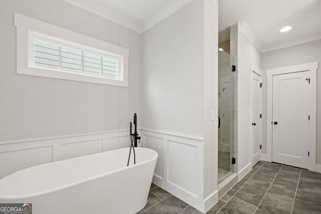 4002 Potter Way, Woodstock, GA 30188 - full bathroom with a soaking tub, a stall shower, wainscoting, recessed lighting, and a decorative wall