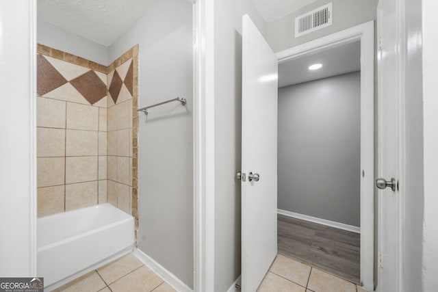 113 Tuxworth Cir, Decatur, GA 30033 - bathroom featuring tile patterned flooring, bathtub / shower combination, baseboards, a textured ceiling, and recessed lighting
