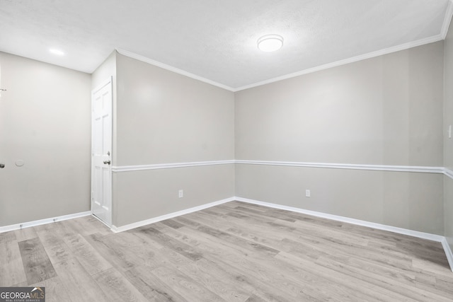 113 Tuxworth Cir, Decatur, GA 30033 - unfurnished room featuring wood finished floors, baseboards, ornamental molding, and a textured ceiling