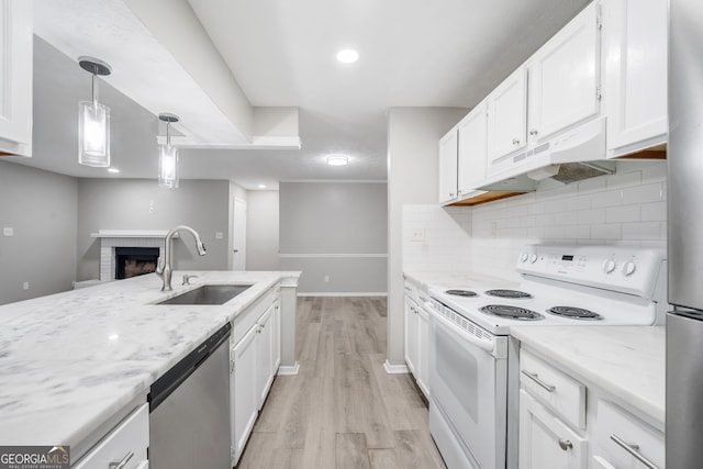113 Tuxworth Cir, Decatur, GA 30033 - kitchen with white range with electric stovetop, a sink, dishwasher, under cabinet range hood, and white cabinetry