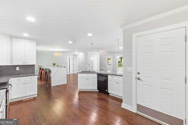 347 Chip Rd, Stone Mountain, GA 30087 - kitchen featuring black dishwasher, a sink, crown molding, dark wood-style flooring, and white cabinetry