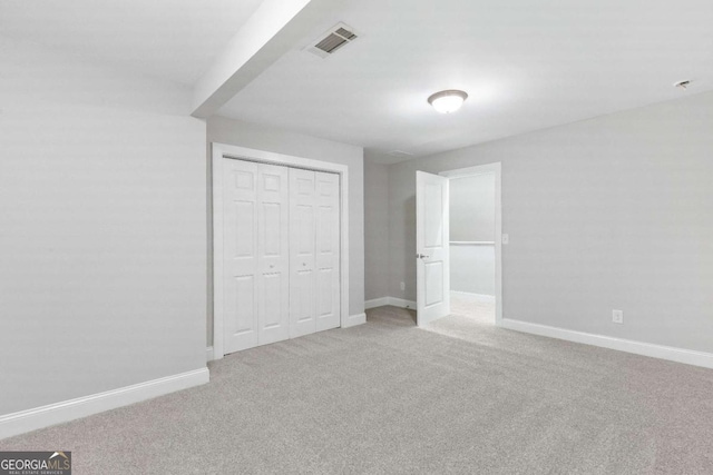 347 Chip Rd, Stone Mountain, GA 30087 - unfurnished bedroom featuring carpet, baseboards, and a closet