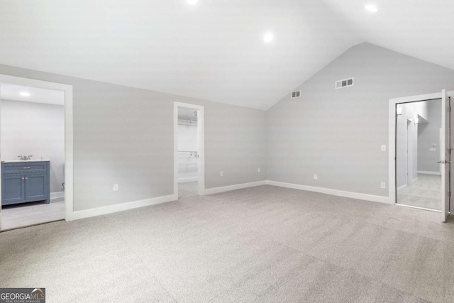 347 Chip Rd, Stone Mountain, GA 30087 - bonus room featuring vaulted ceiling, carpet flooring, baseboards, and recessed lighting