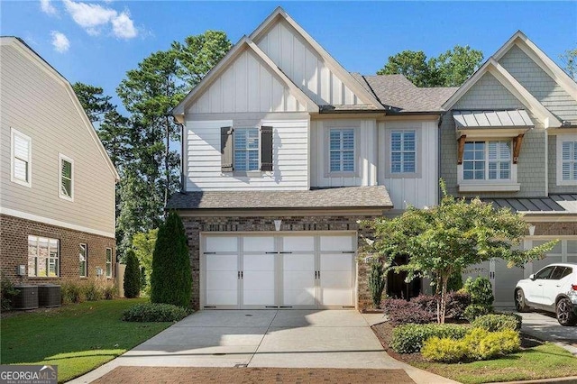 4137 Avid Park, Marietta, GA 30062 - view of front of property featuring board and batten siding, central air condition unit, concrete driveway, and stone siding