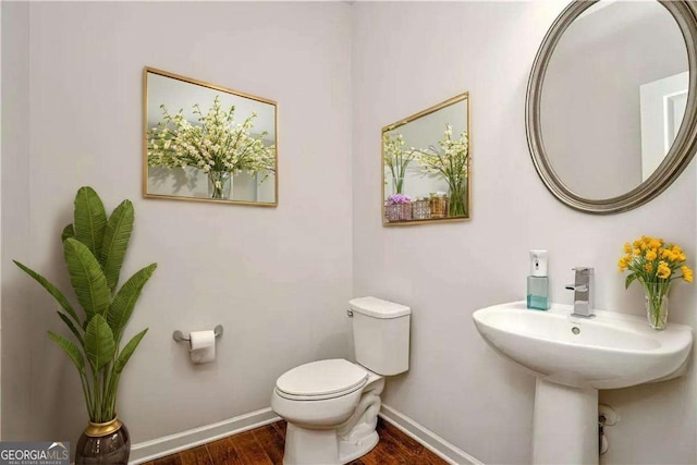 667 Creswell Park, Smyrna, GA 30082 - half bath with wood finished floors, toilet, and baseboards