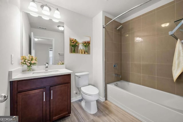 667 Creswell Park, Smyrna, GA 30082 - bathroom with toilet, wood finished floors, vanity,  shower combination, and baseboards
