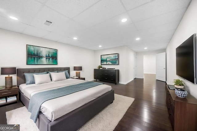 667 Creswell Park, Smyrna, GA 30082 - bedroom featuring dark wood-style flooring, a drop ceiling, recessed lighting, and baseboards