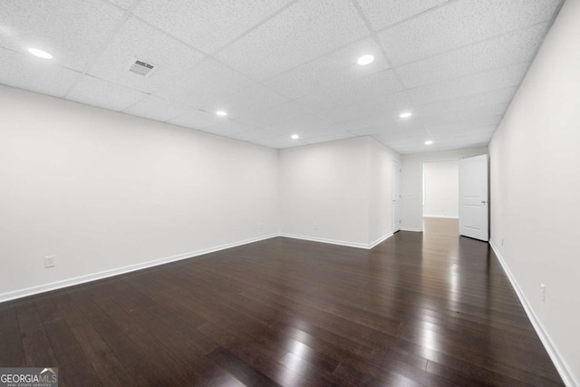 667 Creswell Park, Smyrna, GA 30082 - spare room with dark wood-style floors, baseboards, a drop ceiling, and recessed lighting