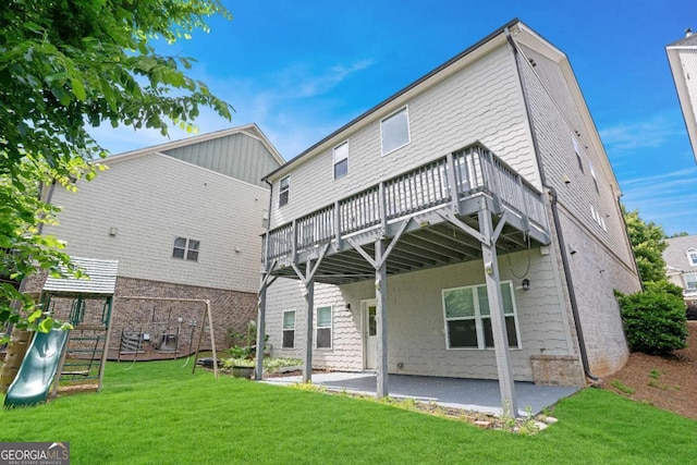 667 Creswell Park, Smyrna, GA 30082 - rear view of property with a lawn, a patio area, a playground, and a wooden deck