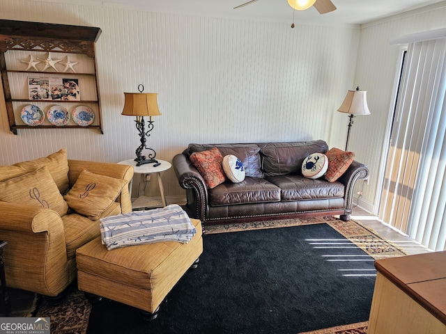 127 Azalea Rd Apt A103, Midway, GA 31320 - living room with a ceiling fan, ornamental molding, and carpet flooring