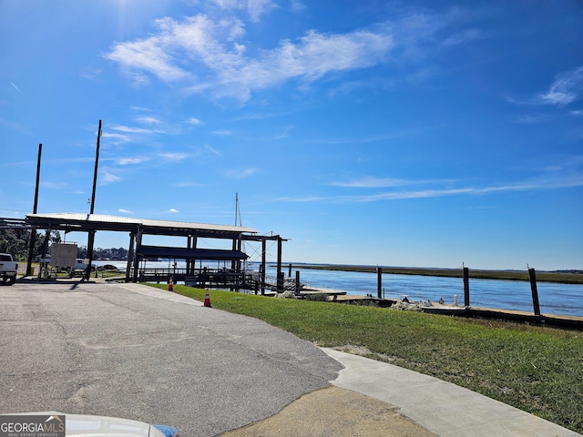 127 Azalea Rd Apt A103, Midway, GA 31320 - dock featuring a water view