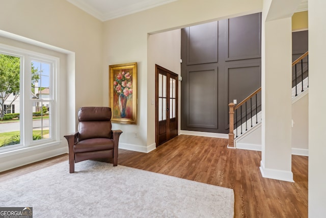 12645 Morningpark Cir, Alpharetta, GA 30004 - foyer with crown molding, baseboards, wood finished floors, and stairway