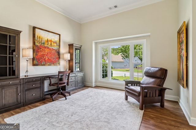 12645 Morningpark Cir, Alpharetta, GA 30004 - office space featuring ornamental molding, built in study area, dark wood-style flooring, and baseboards