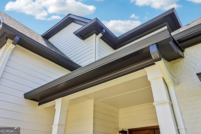 12645 Morningpark Cir, Alpharetta, GA 30004 - exterior view of gutters, a downspout, and brick siding