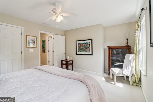 12645 Morningpark Cir, Alpharetta, GA 30004 - bedroom with carpet floors, baseboards, and a ceiling fan