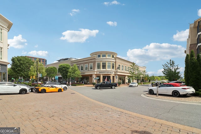 12645 Morningpark Cir, Alpharetta, GA 30004 - view of building exterior featuring uncovered parking