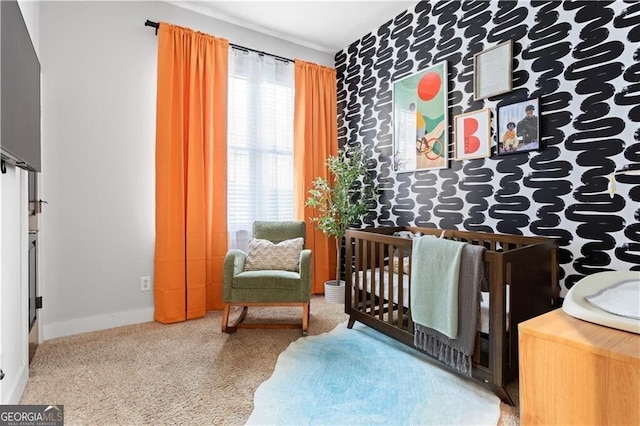 1195 Milton Ter SE Unit 5101, Atlanta, GA 30315 - bedroom featuring a nursery area and baseboards