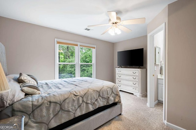 206 Kingsley Way, Woodstock, GA 30188 - bedroom with light colored carpet, baseboards, and ceiling fan