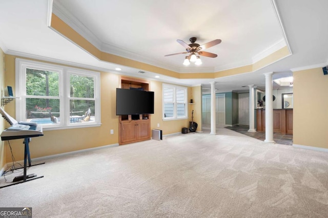 206 Kingsley Way, Woodstock, GA 30188 - unfurnished living room with decorative columns, a tray ceiling, crown molding, carpet, and ceiling fan