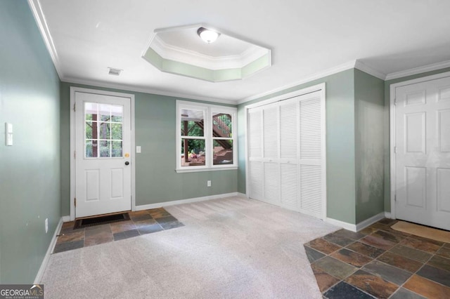 206 Kingsley Way, Woodstock, GA 30188 - foyer entrance featuring crown molding, baseboards, stone tile flooring, and carpet flooring