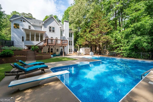 206 Kingsley Way, Woodstock, GA 30188 - rear view of property featuring stairway, a deck, a patio area, a chimney, and view of wooded area