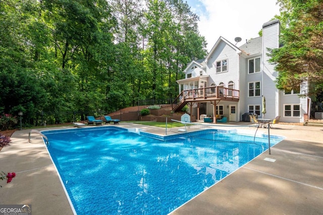 206 Kingsley Way, Woodstock, GA 30188 - view of swimming pool featuring stairs, a wooden deck, and a patio