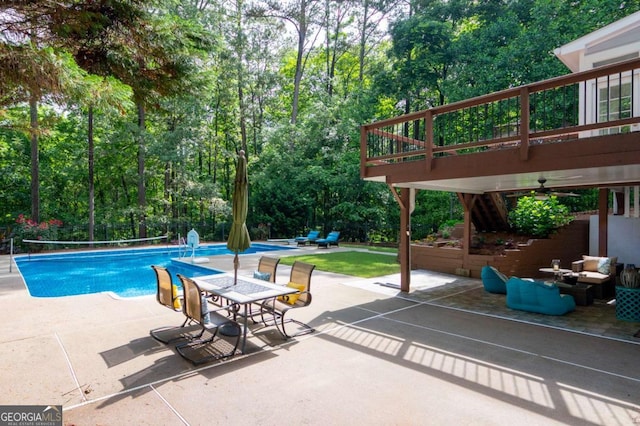 206 Kingsley Way, Woodstock, GA 30188 - outdoor pool with a patio, ceiling fan, outdoor lounge area, and view of scattered trees
