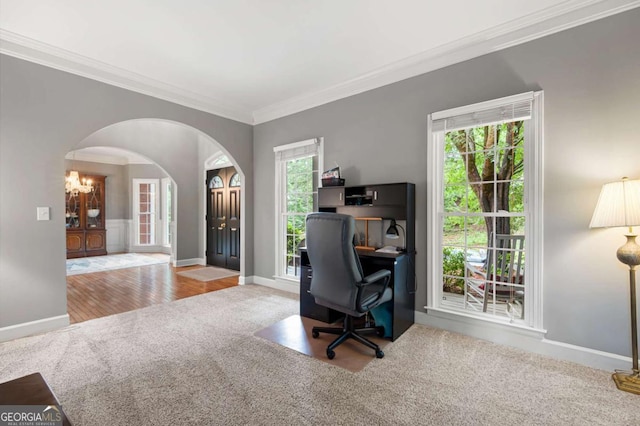 206 Kingsley Way, Woodstock, GA 30188 - carpeted office space with arched walkways, ornamental molding, baseboards, healthy amount of natural light, and a chandelier