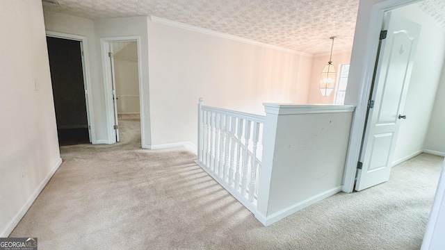 4676 Shaded Oak Ln, Forest Park, GA 30297 - hall with an upstairs landing, carpet, baseboards, and ornamental molding