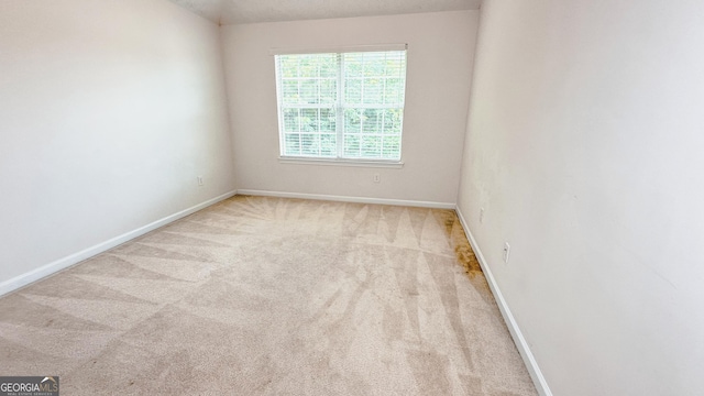4676 Shaded Oak Ln, Forest Park, GA 30297 - carpeted empty room featuring baseboards
