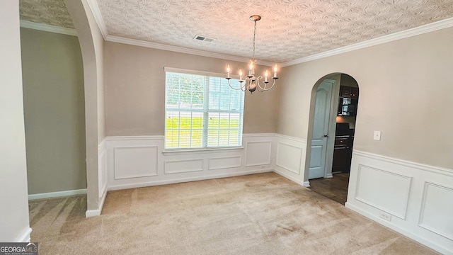 4676 Shaded Oak Ln, Forest Park, GA 30297 - unfurnished dining area with arched walkways, a chandelier, light colored carpet, and a wainscoted wall