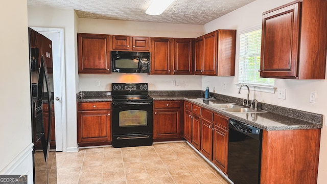 4676 Shaded Oak Ln, Forest Park, GA 30297 - kitchen with black appliances, a sink, dark countertops, and a textured ceiling